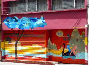 The Dhear and Smithe graffiti mural brings out a bright original touch to an otherwise faceless building in Mexico City. © Anthony Wright, 2009