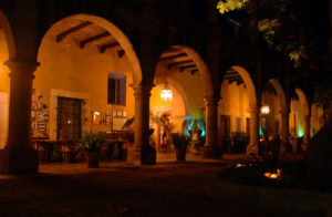 The arched portico of Hacienda El Carmen by night. The gourmet restaurant is located here. © John Pint, 2011