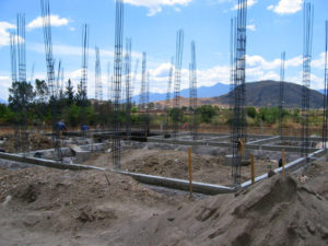 Castillos of rebar rise from the house foundation. © Norma Hawthorne 2008