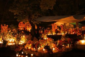 Residents of Tzintzuntzan in Michoacán continue their traditions despite the hordes of tourists who visit the spectacle.