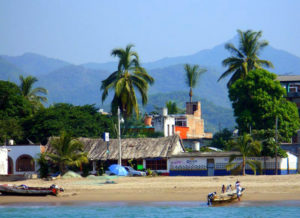 La Peñita de Jaltemba on the coast of the Mexican Pacific means "Place on the sandy shore, across from the cliff." Its beach is frequented by fisherman at the main entrance. © Christina Stobbs, 2009