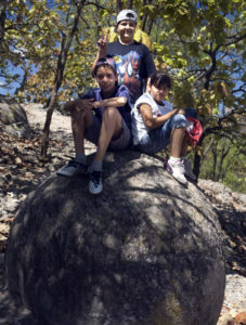 Three children from Ahualulco enjoy playing on the giant balls. So far Mexico's Piedras Bola park receives few visitors, despite the money spent on its development. © John Pint, 2009