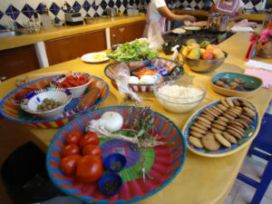 Chef Pilar Cabrera's Casa de los Sabores Oaxaca cooking school is organized, with ingredients for each recipe contained in a separate large, colorful basket. © Alvin Starkman, 2011