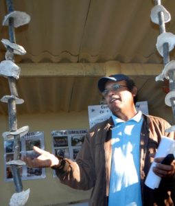 Julio Mata explains the technique used to farm oysters at Boca de Camichín, said to be the only town in Mexico with no one working in the USA © John Pint, 2013