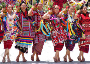 Women from Papaloapam perform the graceful Pineapple Flower Dance. This is part of the annual Guelaguetza festivities in Oaxaca, held the last two Mondays of July. © Oscar Encines, 2008