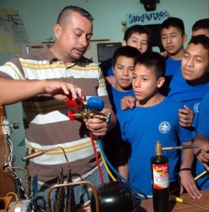 Jose Elias Arias: Refrigeration expert Jose Elias Arias teaching at Boys Town. "This is the same course I give to professionals in Guadalajara," he says. © John Pint, 2012