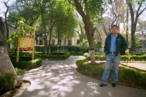 Romeo Tinajero stands in the beautiful courtyard at the museum.