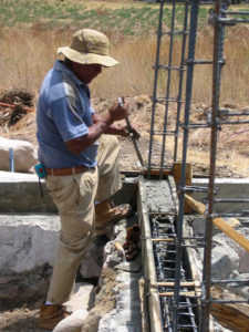 Rebar castillos rising from the foundation will support the walls. © Norma Hawthorne 2008