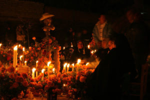 In Arocutín, Michoacán, families stay in the cemetery keeping their lost ones company in the pre-dawn hours.