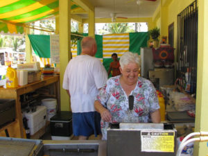 American retirees Kai and Lois Hendriksen serve up 1950s-style burgers and fries in their restaurant in Veracruz, Mexico. © William B. Kaliher, 2010