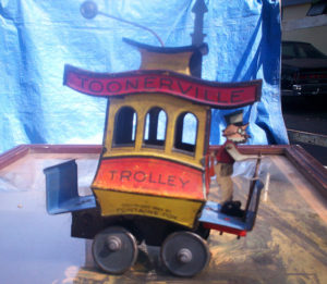 The U.S.-made 'Toonerville Trolley' is a very rare tinplate toy from the 1920s that can sell for as much as $5000 - but was sold for a fraction of that by Carlos and Raul one recent Saturday to an early bird collector at their Cuauhtemoc stall.