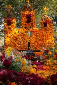 Ofrendas are created with such detail and often take weeks to complete. The zempazuchitl, or marigold, is thought to light the way home for returning souls.