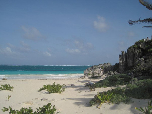 Beautiful white sand and turquoise waters can be appreciated 5 minutes away from the Tulum ruins on this virgin Caribbean beach.