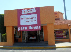 Mexico City restaurants such as El Porton try to weather the storm by offering "take out" service. Because the flu is passed from person to person, preventive measures include discouraging situations in which strangers gather in an enclosed environment. © Anthony Wright, 2009