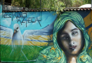 This magical portrait of the Virgin carries a message of peace. It is one of many graffiti murals on the Estadio Azteca (Aztec Stadium) in Mexico City. © Anthony Wright, 2009