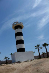 This abandoned lighthouse sits at one end of the beach in Todos Santos, Mexico, near a spot where local fishermen, for years, have departed each morning to chase tuna in the Pacific Ocean. © Mariah Baumgartle, 2012
