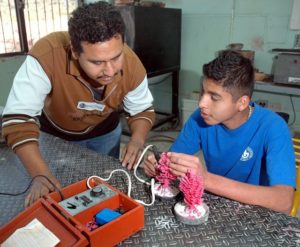 Lost wax is one of several techniques students master in their jewelry-making workshop. Children at Mexico's Villa de los Niños spend a number of years learning one or more of 14 different trades or skills taught to them by experts. © John Pint, 2012