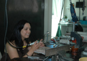 An artisan jewelry maker creates her jewelry at her shop at Centro Platero de Zacatecas, a modern collection of buildings which house silver workshops. It is located between downtown Zacatecas and Guadalupe. © Jane Ammeson, 2009