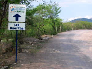 Sign on gravel road leading to Las Huertas. © Julia Taylor, 2007