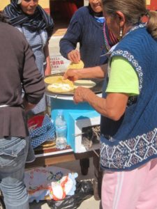 Making tortillas on a small fuel-efficient stove. © Edythe Anstey Hanen, 2013