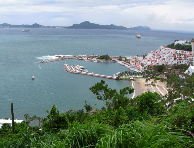 The famous Las Hadas Hotel has the probably best marina and beach in Manzanillo, Mexico.