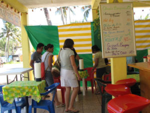 Hamburguesas de Los Abuelos serves burgers, fries, wings and cheesecake, as seen on the menu of this Veracruz hamburger hut. © William B. Kaliher, 2010