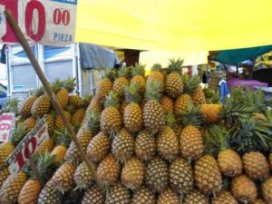 Pineapples for sale in Mexico City's La Merced market © Peter W. Davies, 2013