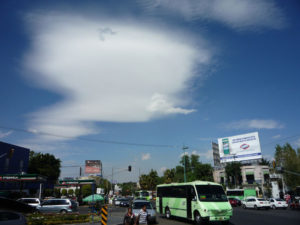 Benign sky above a busy Mexico City street © Anthony Wright, 2011