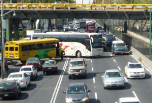 In Mexico City, traffic rushes past no matter which way you look. © Anthony Wright, 2011