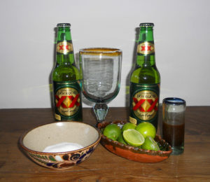 The basic ingredients for a Mexican michelada: salt, lemon and beer. The 'chirimico' is optional. © Daniel Wheeler, 2011