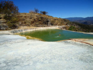 A lone swimmer soaks in a mineral pool in the Oaxaca countryside © Alvin Starkman, 2012