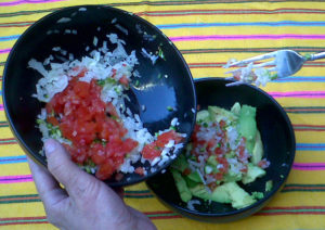 Dump the onion, chile serrano and cilantro into the bowl with the avocado. © Daniel Wheeler, 2009