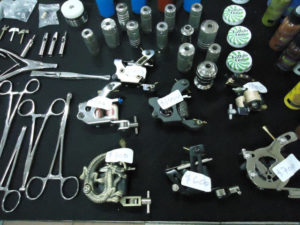 Modern tattoo equipment and supplies for sale at the Tattoo Fest in Oaxaca, Mexico © Alvin Starkman, 2011