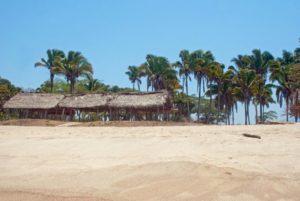 The beach at El Monteon on Mexico's Nayarit Riviera is wonderful for swimming and walking, which is especially enjoyable at low tide. © Christina Stobbs, 2012