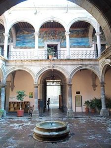 The Museum of Michoacan southwest of the zocalo is a prime example of colonial architecture. The fountain in the courtyard is a nice touch. A typical muraled wall above the entrance.