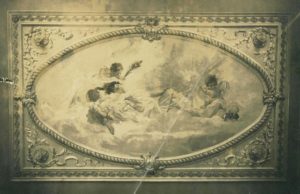 The ceiling mural showing cherubs similar to those sketched in Josefina's autograph book. The theme is "temptation" — the struggle of Virtue over Vice. It is signed E. Serbaroli 1913, and was done for the Chihuahua estate of Martin Falomir, a wealthy industrialist who made his fortune in mining and other business ventures. © Joseph A. Serbaroli, Jr., 2014