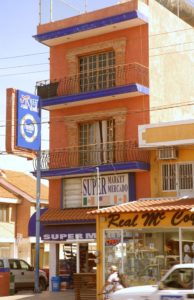 A typical building on Mazatlan's Camaron-Sabalo street has stores below and apartments above. © Gerry Soroka, 2009