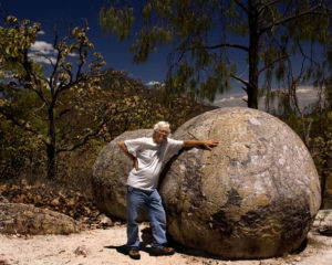 John Pint with one of the smaller Piedras Bola. Megaspherulites have been found in a few other places in the world, but none are as large as those near Ahualulco, Mexico, some of which are nearly 10 meters in diameter. © John Pint, 2009