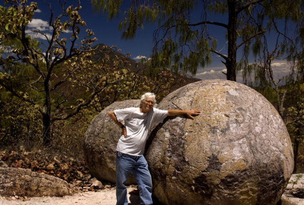 John Pint with one of the smaller Piedras Bola. Megaspherulites have been found in a few other places in the world, but none are as large as those near Ahualulco, Mexico, some of which are nearly 10 meters in diameter. © John Pint, 2009