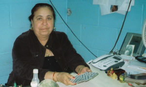 Nena is a curandera and card reader in Amarillo, Texas. She performs limpias, gives advice and also reads cards. © John G. Gladstein, 2010