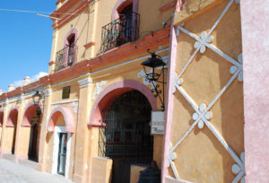 Ornate masonry and lacy black wrought iron adorn El Castillo. The 18th century building houses the Bernal, Querétaro municipal government. © Jane Ammeson 2009