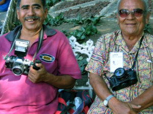 Picture, please. These professional street photographers at the Zocolo in Acapulco reverse roles as they pose for a wandering photographer's camera. © Gerry Soroka, 2009