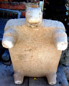 A 600-year-old metate found while digging in the local Mexican cemetery, suggests that the ancestors of the people of San Lucas included basalt sculptors. 'The workmanship on this piece is extraordinary,' says artisan Victor Cocula. 'We can't match it.' © John Pint, 2012