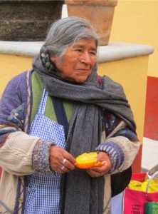 Fresh oranges are served as dessert at this weekly luncheon for the elderly in San Miguel de Allende © Edythe Anstey Hanen, 2013