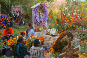 A strong sense of community is apparent as many extended families from Santa Fe de la Laguna arrive to accompany their loved ones' spirits.