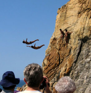 High flyers at Acapulco carry on the famous tradition of cliff diving. They perform in the afternoon and later under the lights. © Gerry Soroka, 2009