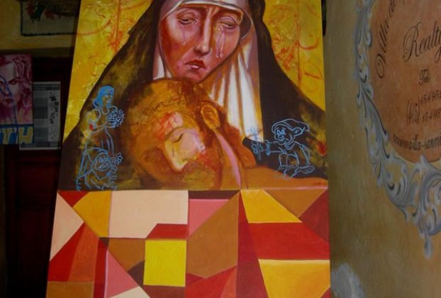 A painting of Mary and Jesus stands in a hotel doorway in San Miguel de Allende. The altars are dedicated the Virgin of Sorrows © Edythe Anstey Hanen, 2014