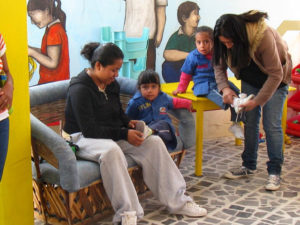 Parents and children at CORAL, a charity in Oaxaca, Mexico to assist the deaf and hearing impaired © Alvin Starkman, 2010