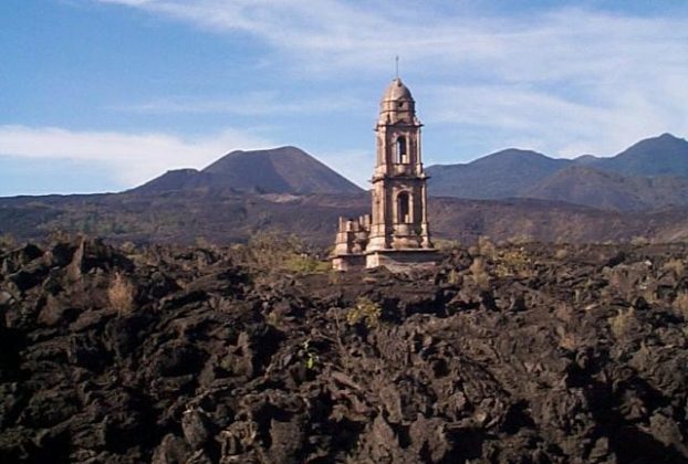 It is a relatively easy walk to the Templo San Juan partially buried by Paricutin (approx 50 feet of lava). I was surprised to find lots of people around the church. A tent restaurant is nearby where you can buy drinks and food. © Rick Meyer, 2001