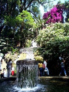 One of the most popular and photographed spots is this one near a bridge with a fountain and waterfall. People can walk a bridge across the lowest waterfall.